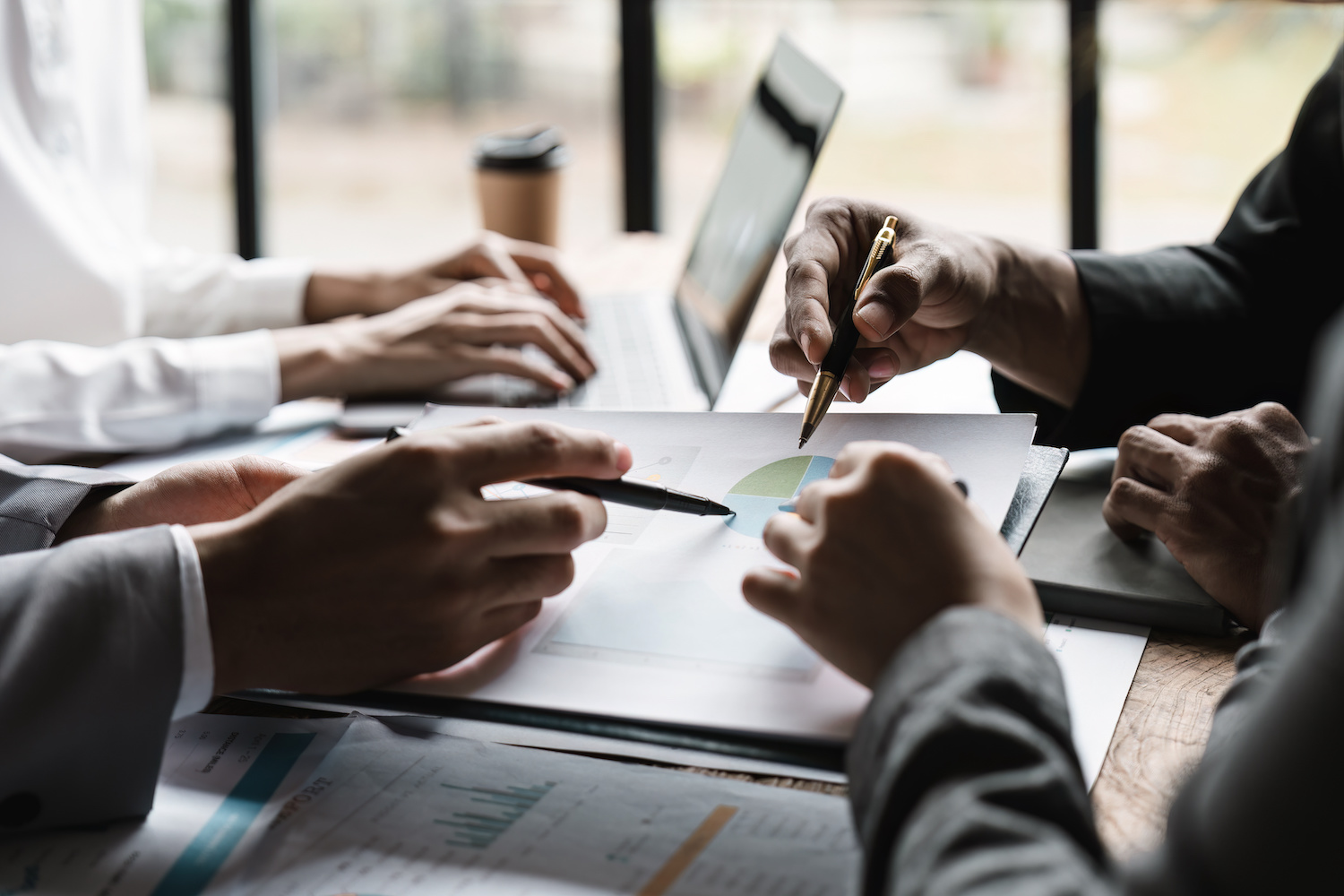 Startup business meeting to analyze and discuss the situation on the financial report in the meeting room. Investment Consultant, Financial advisor and accounting concept.